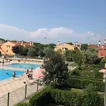 Townhouse With Garden And Pool In Appartement Bibione